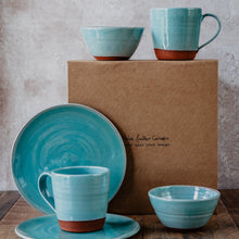 Load image into Gallery viewer, Breakfast set for 2 people, turquoise pottery in front of a brown gift box.
