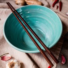 Load image into Gallery viewer, Turquoise bowl with chopsticks from above on a cream tablecloth with garlic, chilli and ginger scattered around.
