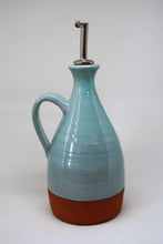 Load image into Gallery viewer, Turuoise oilbottle with a metaltop on a white background
