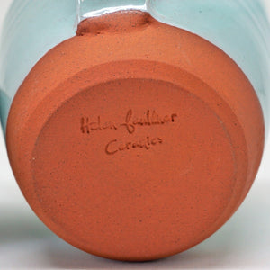 Terracotta pot base with Helen Faulkner Ceramics impressed on the base.