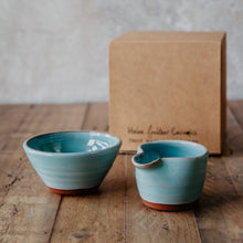 Load image into Gallery viewer, Mini turquoise bowl and mini milk jug in front of a brown gift box
